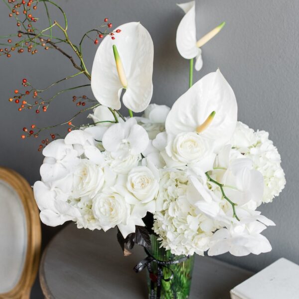 White flowers in a vase by Lela Design 5