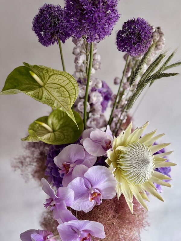 Extravagant flowers in a white vase